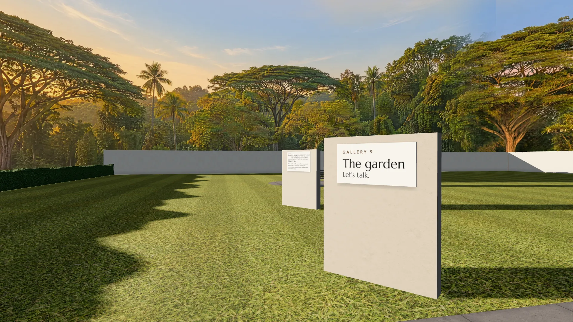 Gallery 9: a walled garden in low gold sun, a gravel path crossing the lawn towards 2 chairs set facing each other.